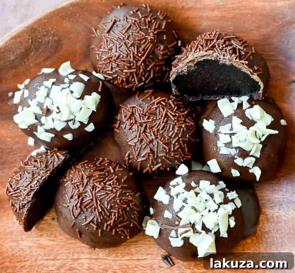 Creamy Oreo Bliss 2 Decadent no-bake Oreo truffles coated in smooth chocolate, made with only 4 ingredients. The best easy homemade Oreo balls recipe.