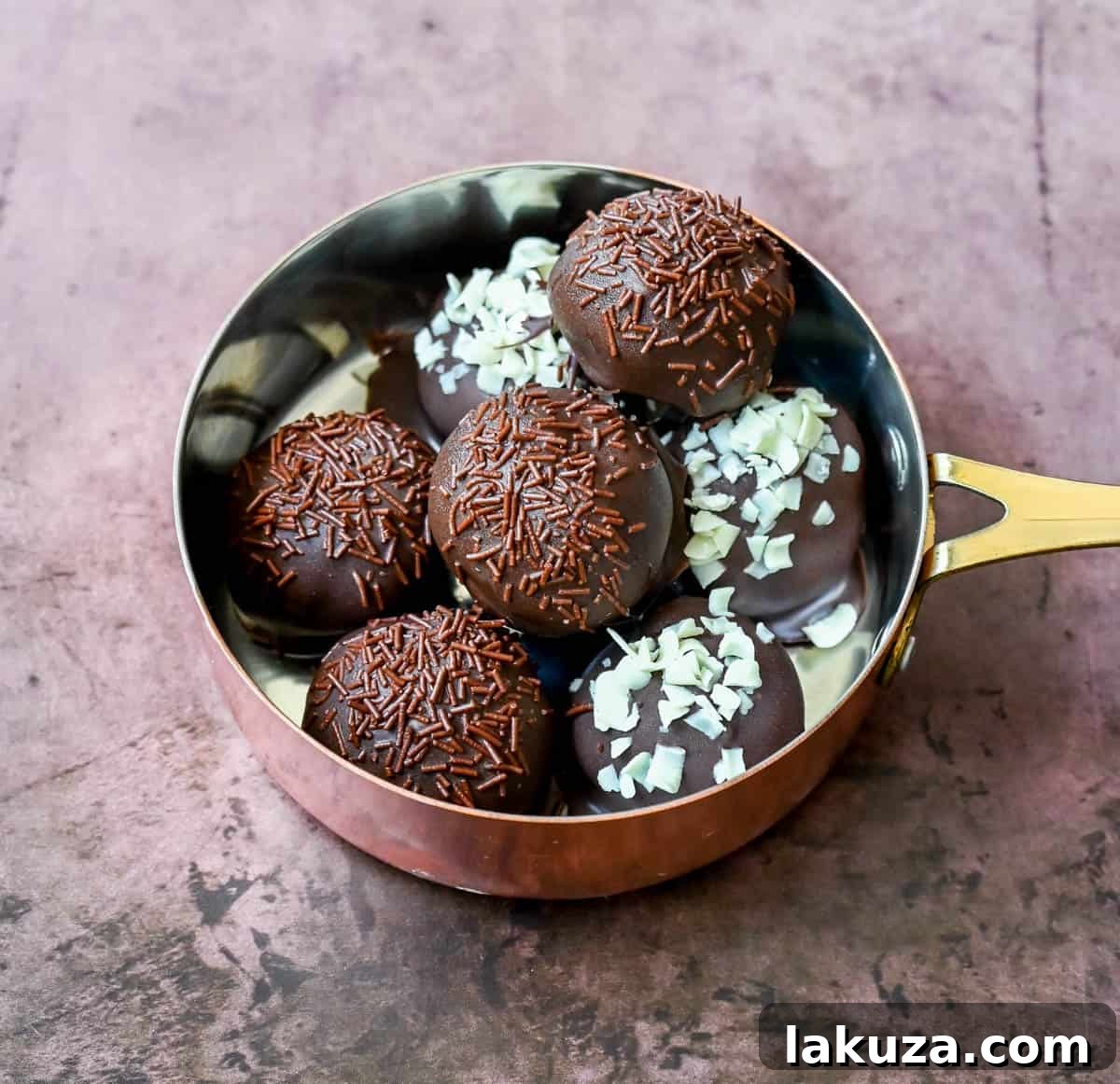 Creamy Oreo Bliss 3 Easy 4-ingredient Oreo truffles with a smooth chocolate coating. A perfect no-bake dessert for any occasion.