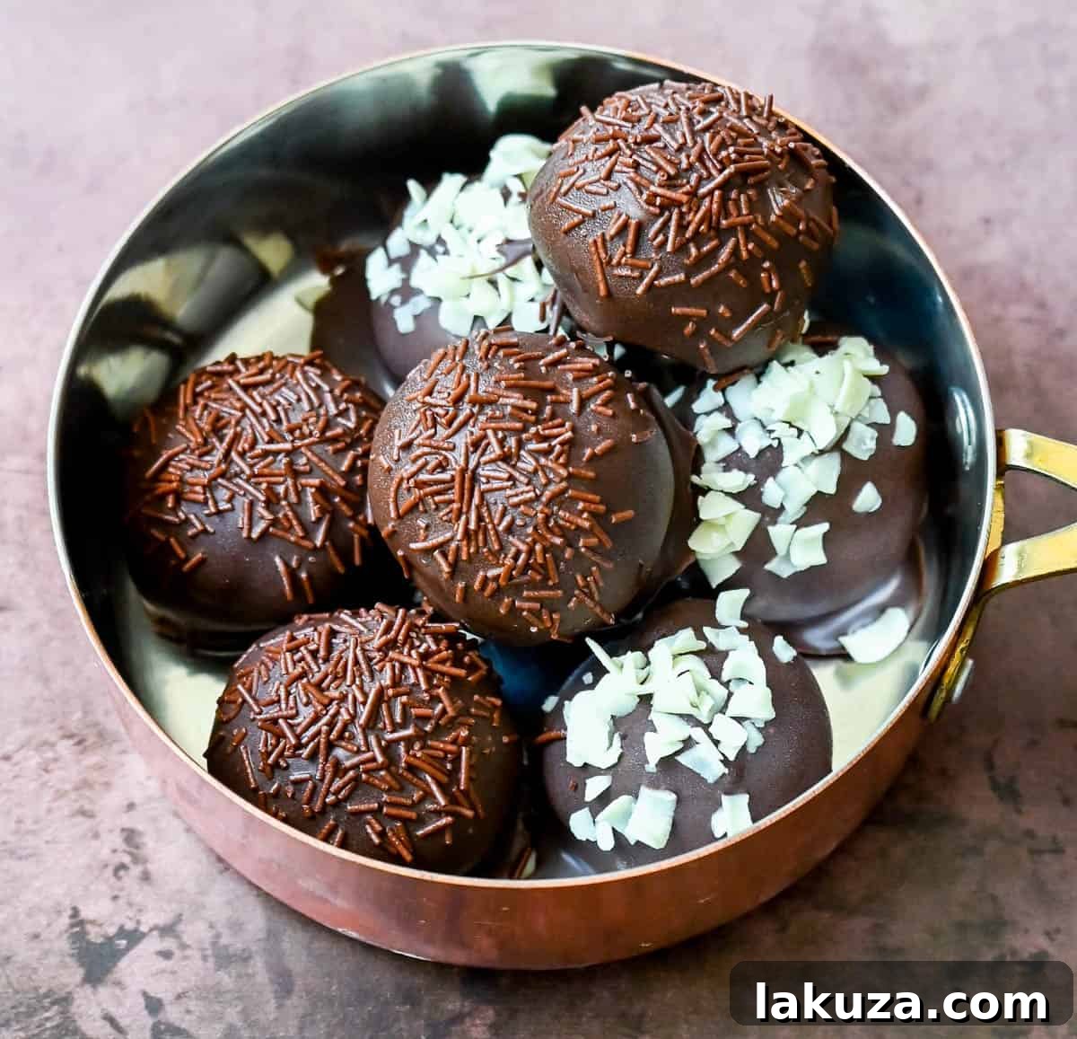 Creamy Oreo Bliss 5 Simple Oreo truffle ingredients: classic Oreos, softened cream cheese, semi-sweet chocolate, and coconut oil or butter.