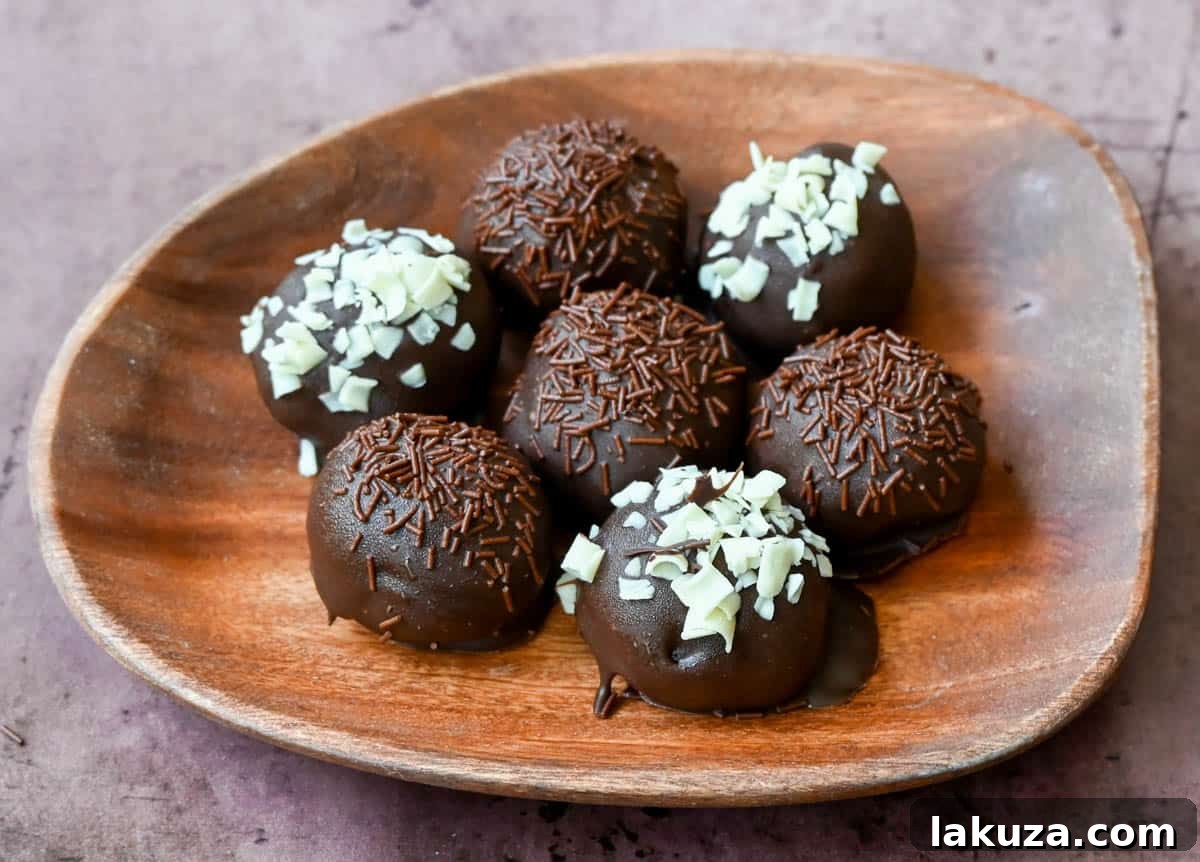 Creamy Oreo Bliss 6 Step-by-step guide to making easy no-bake Oreo truffles. Crush Oreos, mix with cream cheese, chill, roll, and dip in chocolate.
