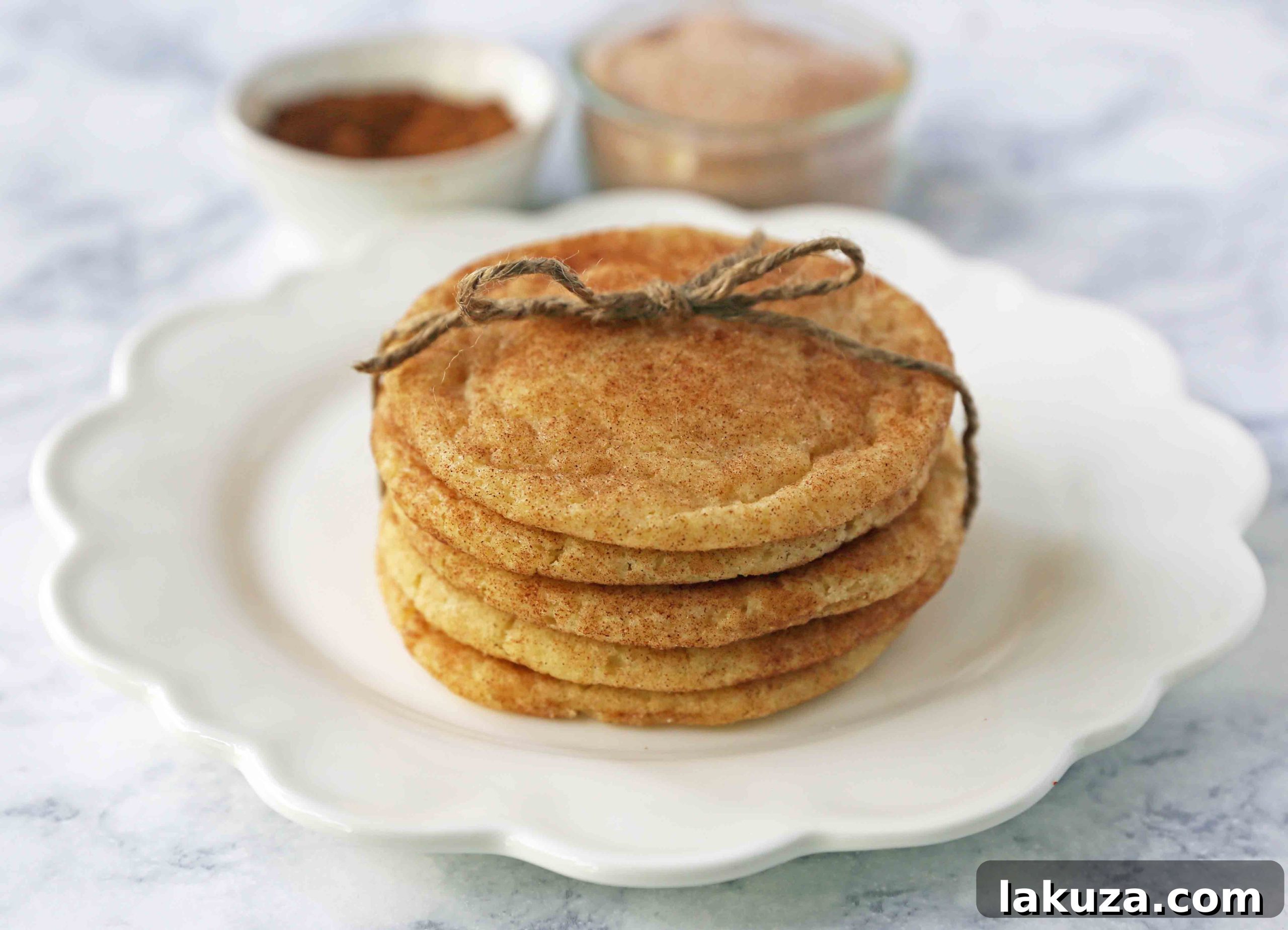 The Best Snickerdoodle Cookie Recipe. Soft and Chewy Snickerdoodle Cookies. The popular cinnamon-sugar soft and chewy sugar cookie recipe. A recipe that has been in the family for over 30 years! #snickerdoodle #snickerdoodles #snickerdoodlecookies #snickerdoodlecookie #cookie #cookies #christmascookies #christmascookies www.modernhoney.com