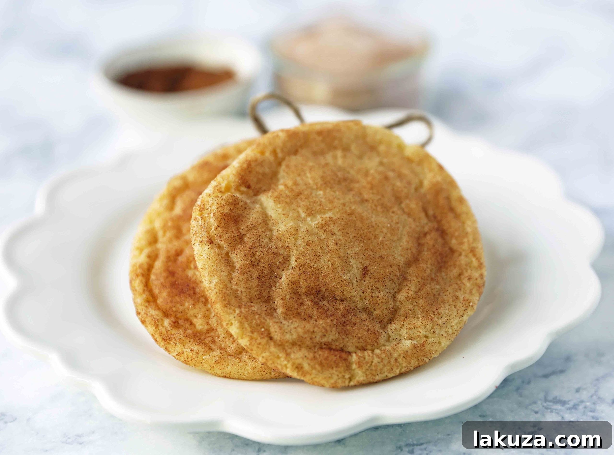 The Best Snickerdoodle Cookie Recipe. Soft and Chewy Snickerdoodle Cookies. The popular cinnamon-sugar soft and chewy sugar cookie recipe. A recipe that has been in the family for over 30 years! #snickerdoodle #snickerdoodles #snickerdoodlecookies #snickerdoodlecookie #cookie #cookies #christmascookies #christmascookies www.modernhoney.com