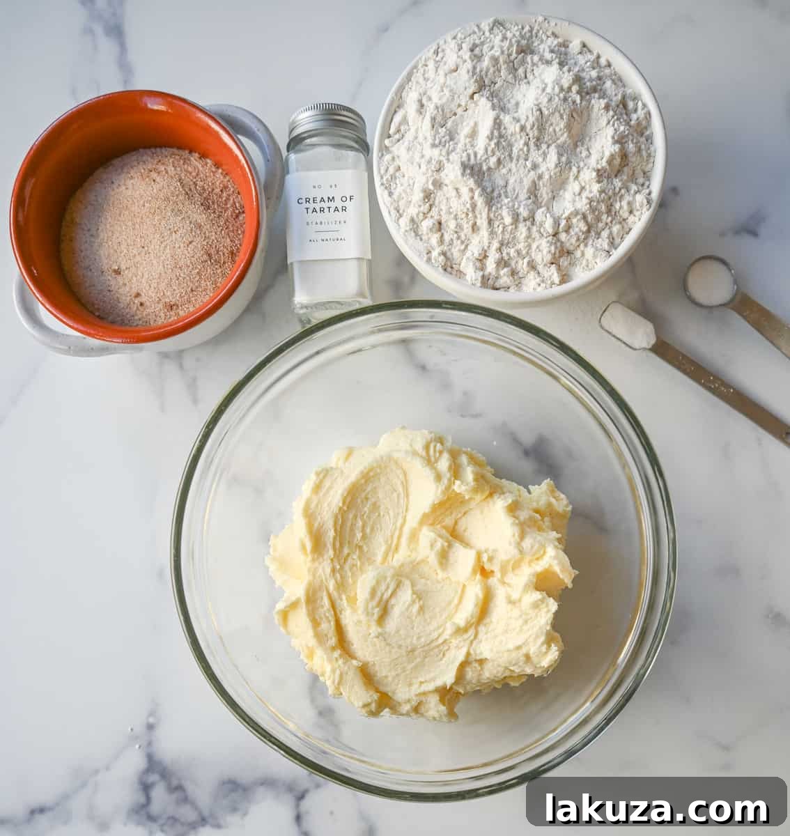 Making snickerdoodles and creaming together butter and sugar