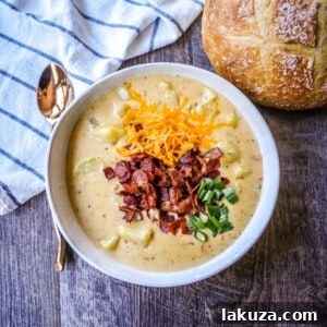 Loaded Baked Potato Soup 7 The Best Baked Potato Soup Recipe. This Potato Cheese Soup is the perfect potato soup topped with crispy bacon, cheddar cheese, and green onions.