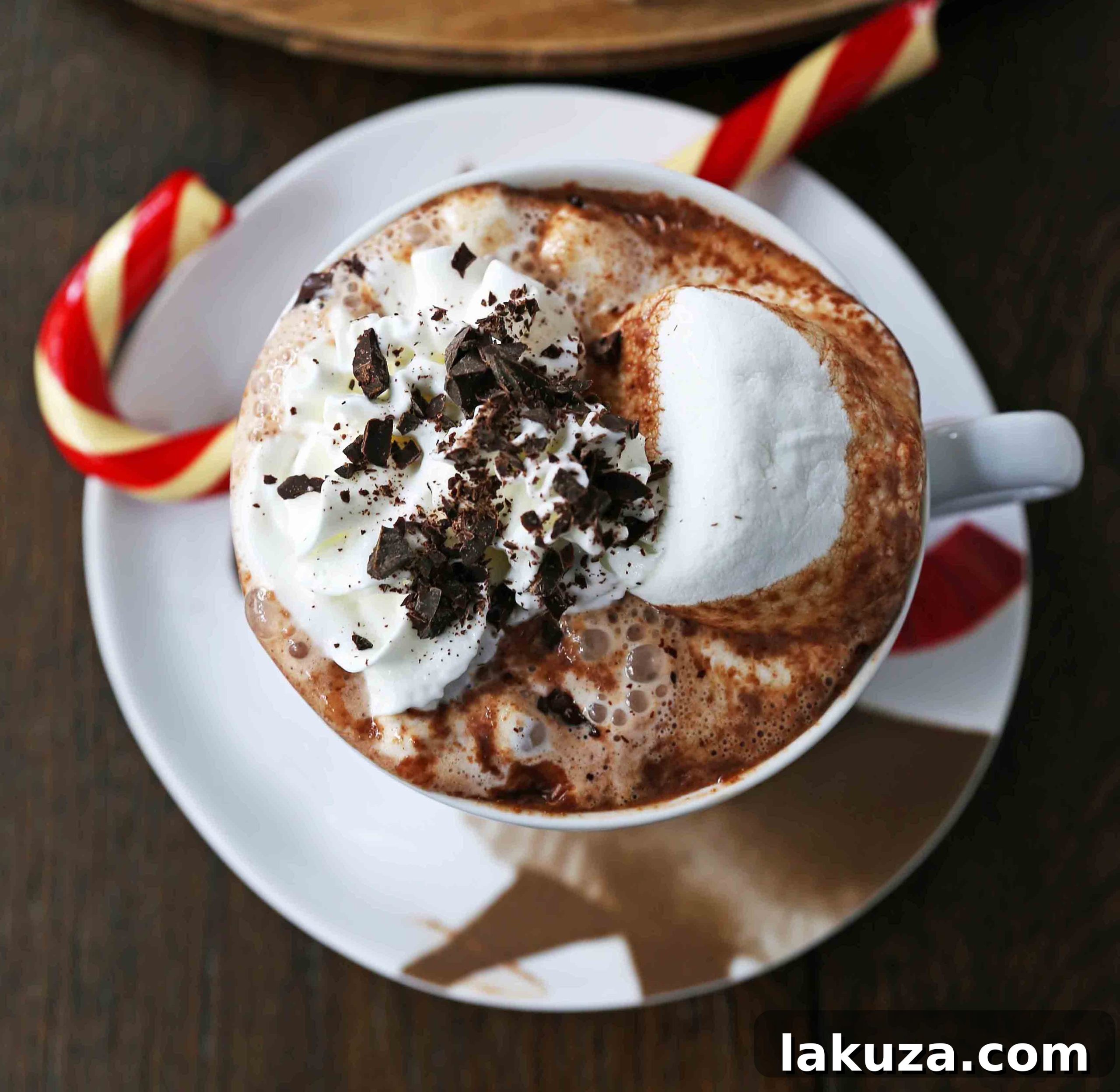 Homemade Hot Chocolate Recipe. How to make easy 5-ingredient gourmet hot chocolate. This Slow Cooker Hot Chocolate is perfect to serve at parties. A list of hot chocolate toppings ideas to make your very own Hot Chocolate Bar. www.modernhoney.com #hotchocolate #homemadehotchocolate #chocolate #hotchocolatebar #hotchocolatetoppings #christmas