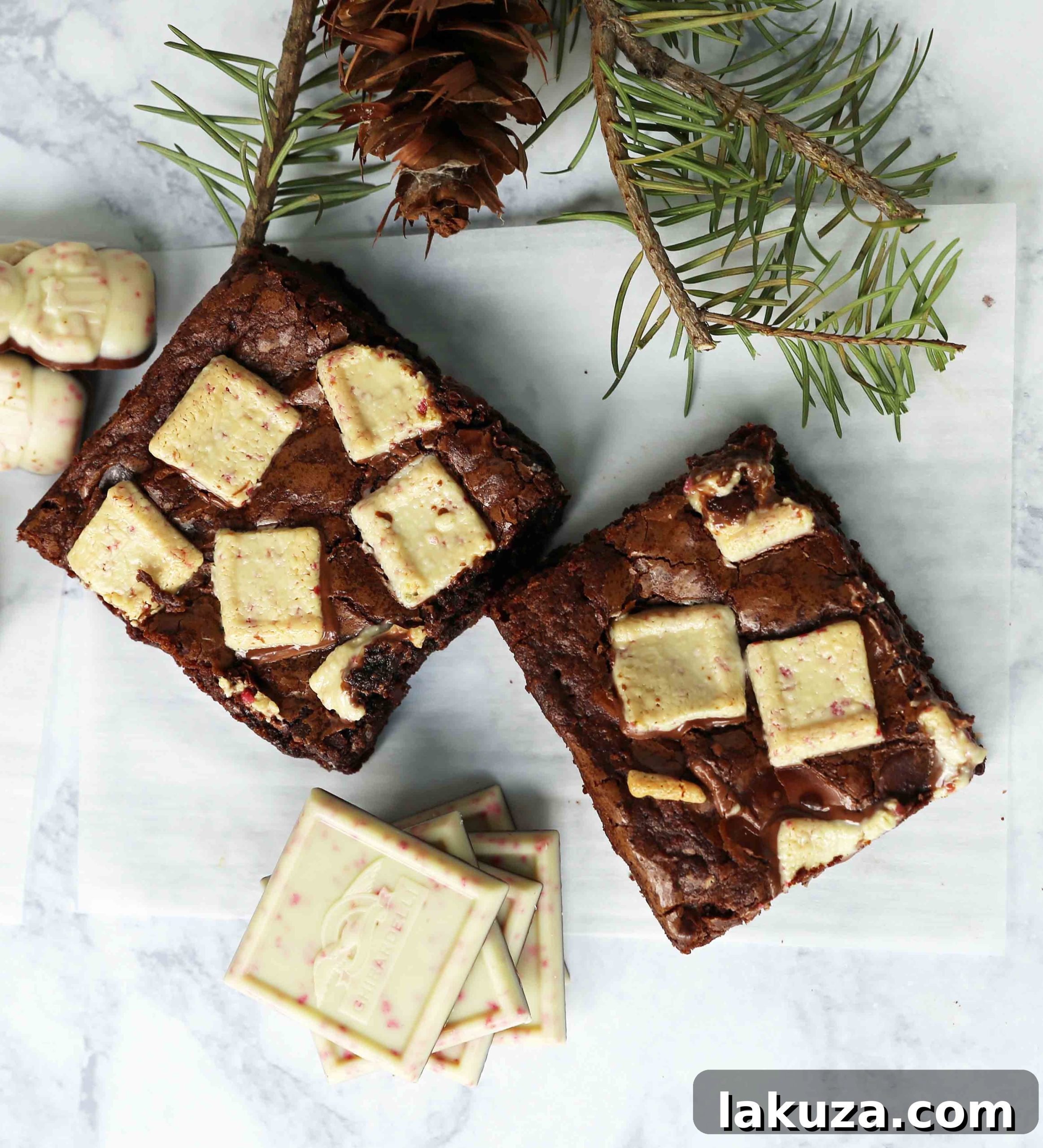 Artistically arranged Peppermint Bark Brownies on a white cake stand, ready for a holiday gathering
