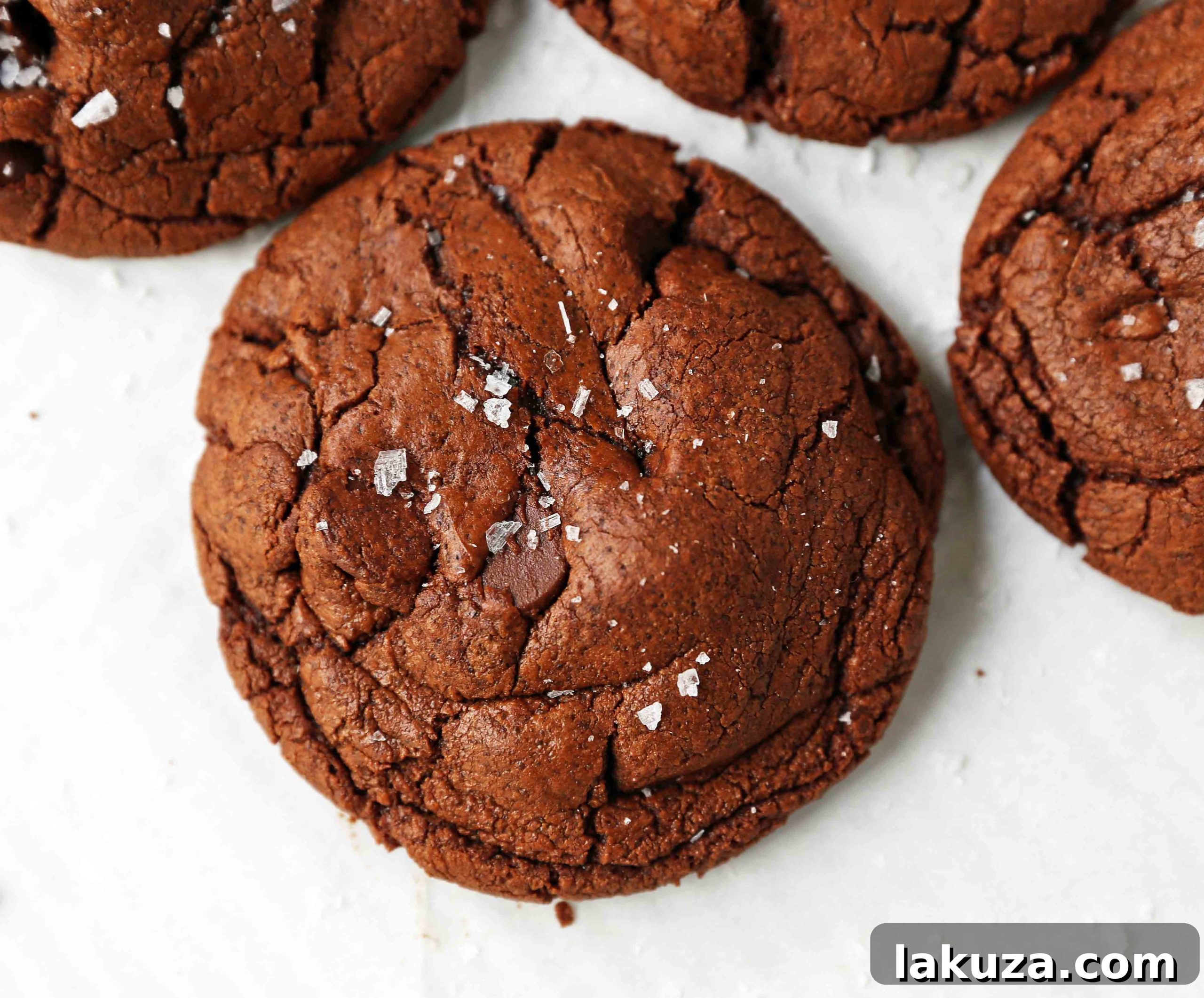 Decadent Chocolate Brownie Cookies 4 A stack of perfectly baked chocolate brownie cookies, highlighting their crinkly tops and rich, dark color.