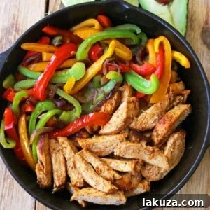 The Best Chicken Fajitas Recipe. Flavorful, juicy, seasoned chicken fajitas with sauteed onions and peppers.  The perfect chicken fajitas recipe!