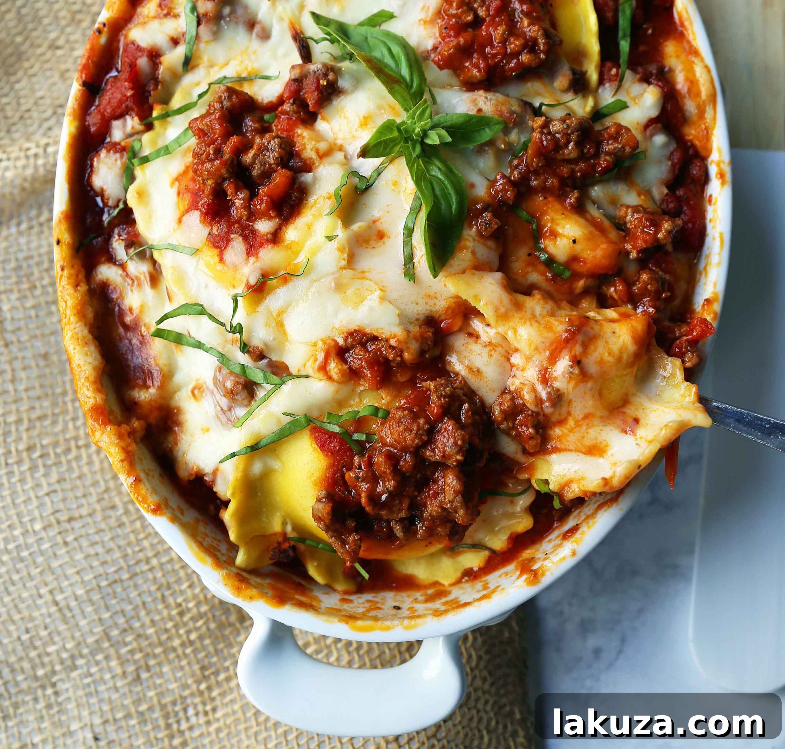 Ravioli Lasagna is a huge time saver. It eliminates the need for ricotta cheese or bechamel sauce layers. No need to make a homemade bechamel sauce or whip up a ricotta cheese, egg, and parmesan mixture.