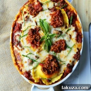 Ravioli Lasagna. Quick and Easy Lasagna Recipe made with cheese ravioli, meat sauce, and melted mozzarella cheese. How to make the best ravioli lasagna. www.modernhoney.com #lasagna #italian #italianfood #ravioli #dinner #dinnerrecipe
