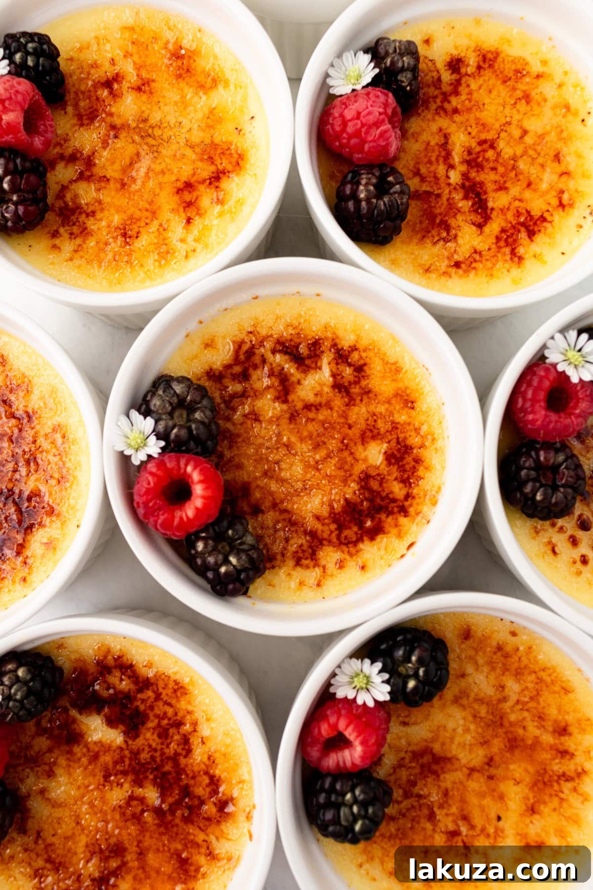 Creme Brulee in ramekins. A creamy, silky vanilla custard topped with crisp sugar crust is one of the most popular desserts at restaurants for good reason. With its silky custard base and crackly caramelized sugar topping, it’s a showstopper that’s surprisingly easy to make at home. 