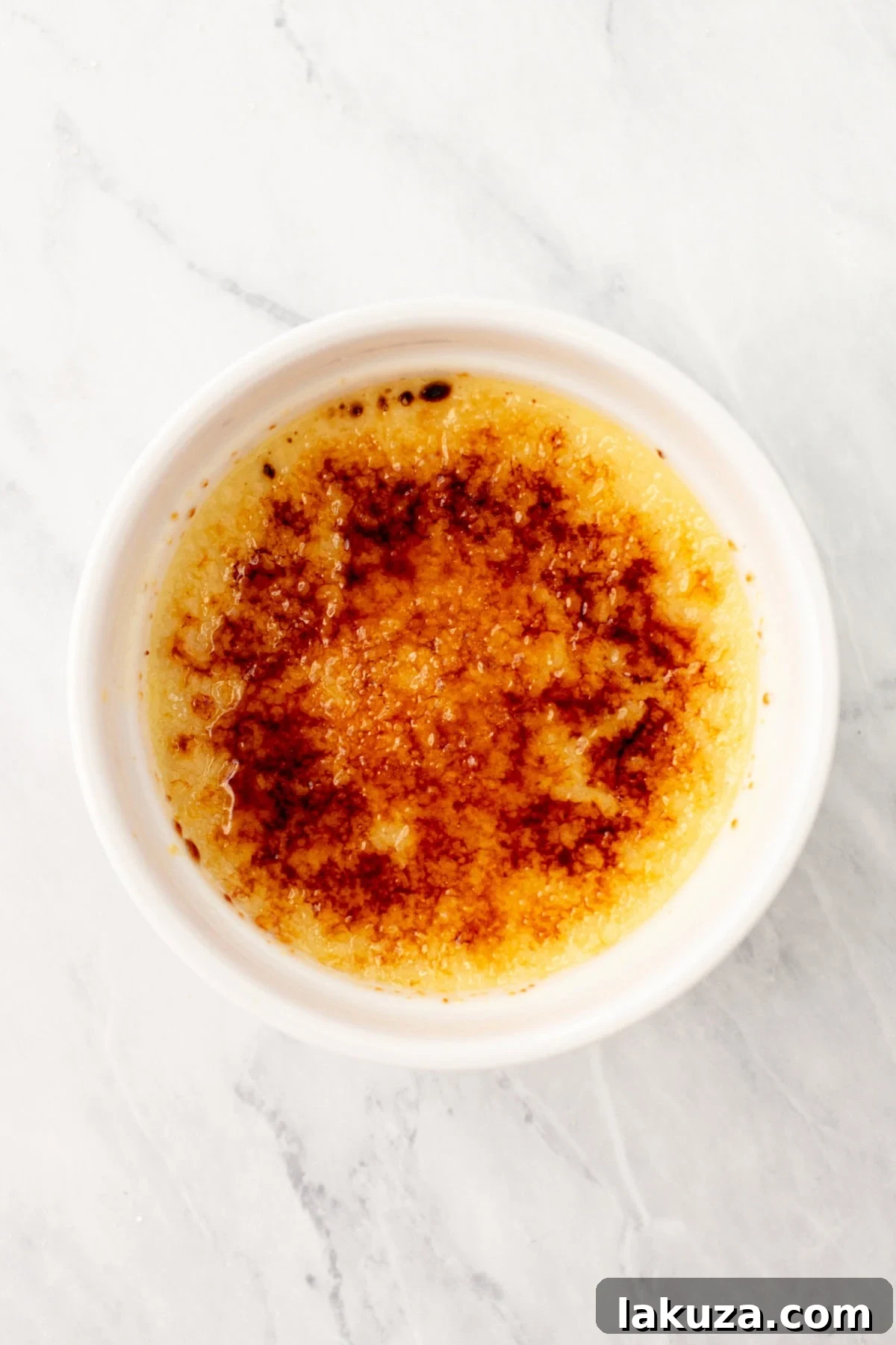 Creme brulee after caramelizing the sugar with a kitchen torch