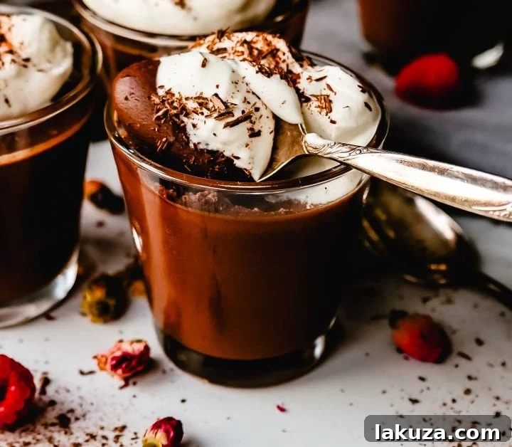 Velvety Chocolate Dream 2 Chocolate Pot de Creme. Rich velvety smooth chocolate custard topped with fresh whipped cream. A pot of cream made with melted chocolate, heavy cream, sugar, and egg yolks. A decadent chocolate dessert!
