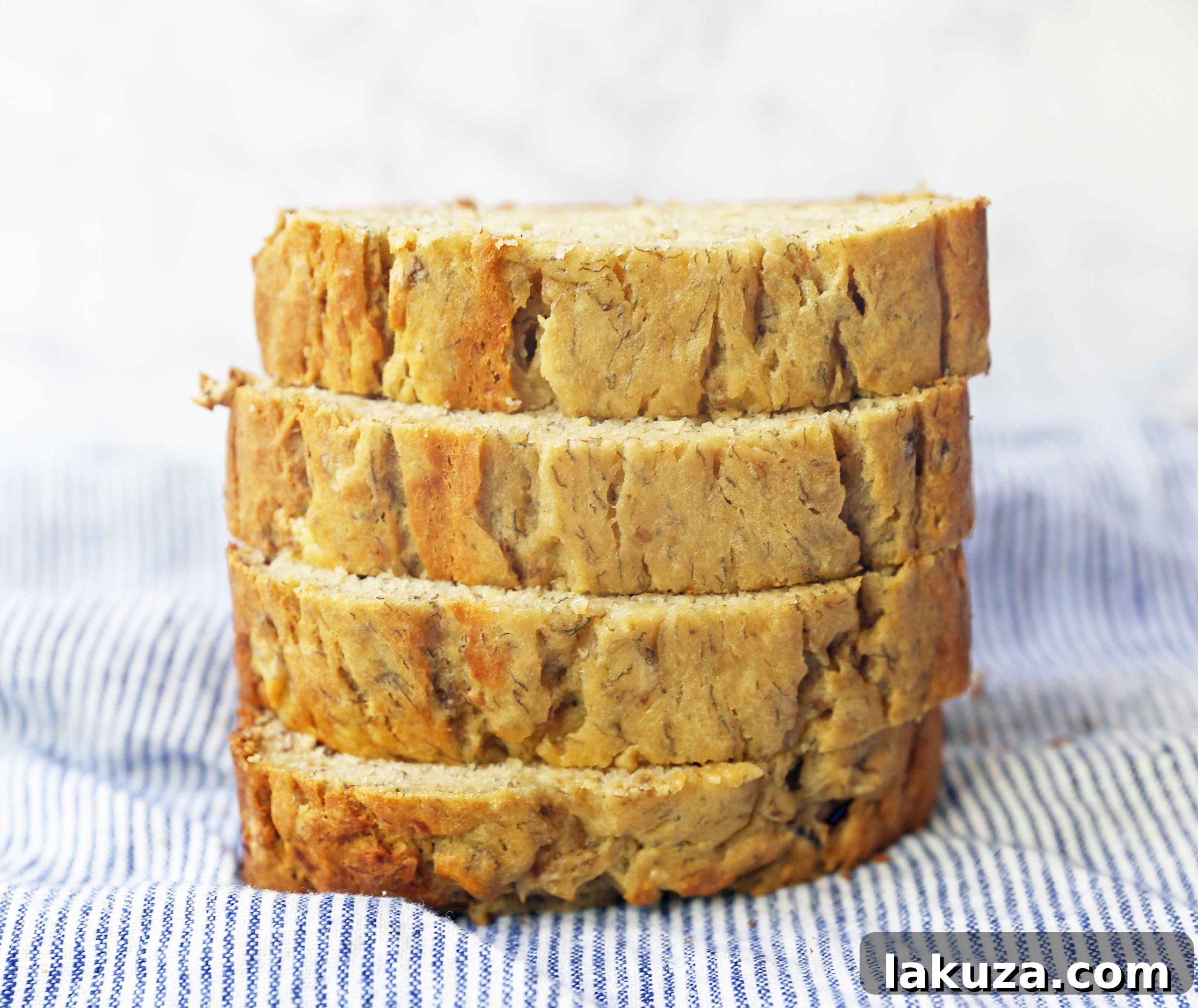 A freshly baked loaf of banana bread, golden brown and perfectly risen