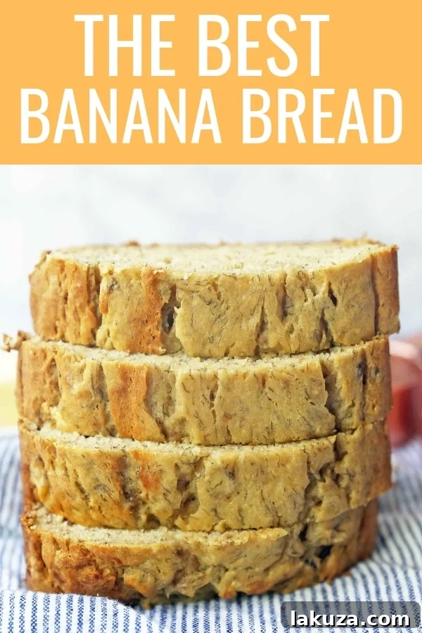 A beautifully sliced banana bread loaf, ready to be enjoyed with a hot beverage