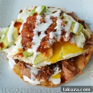 Spicy Chorizo Huevos Rancheros Tostadas 5 Chorizo Huevos Rancheros Tostadas by Modern Honey - www.modernhoney.com