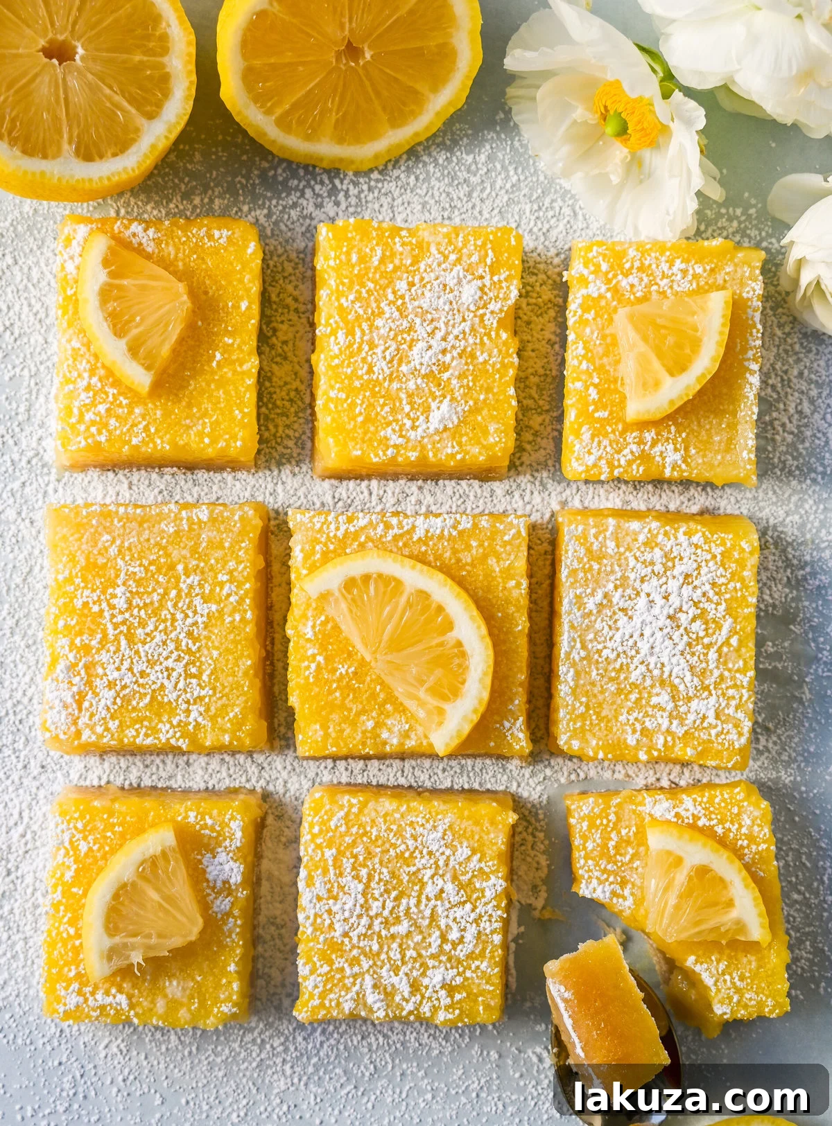 Sunshine Lemon Squares 2 Classic Lemon Bars: Tangy lemon curd over a buttery shortbread crust. The perfect balance of sweet and tart, ideal for any lemon dessert lover.