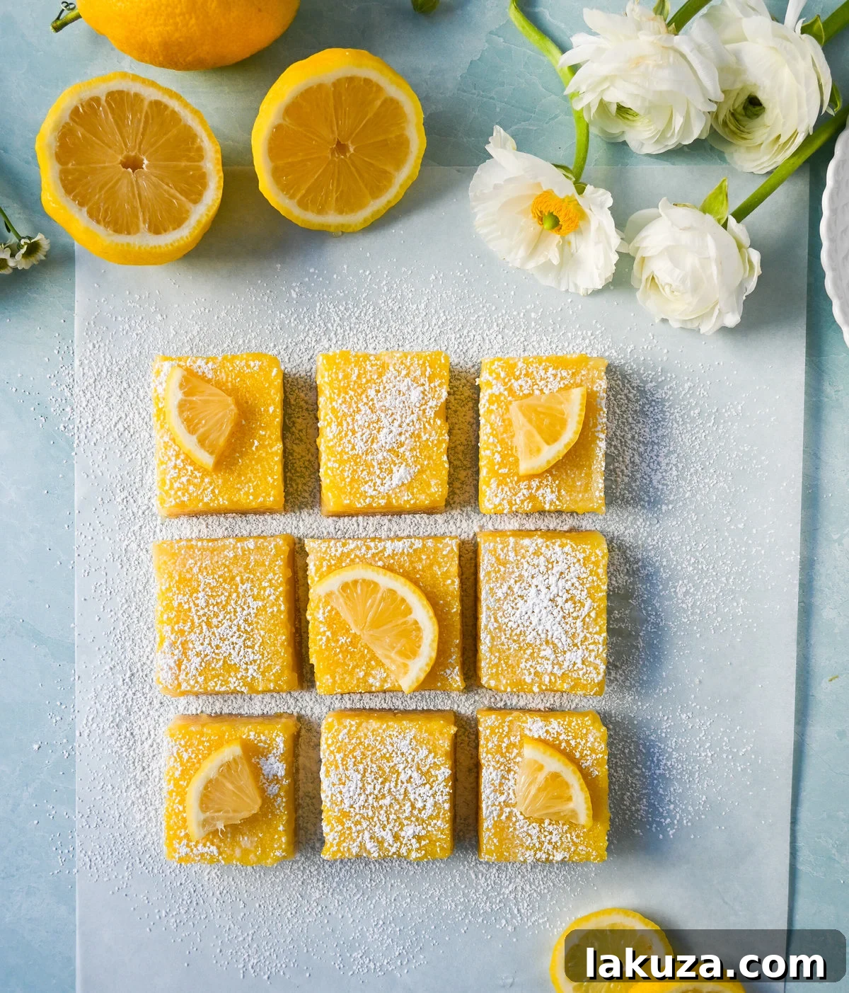 Sunshine Lemon Squares 4 Close-up of the smooth, yellow lemon curd filling on top of a crumbly shortbread crust, ready to be sliced into individual lemon bars.