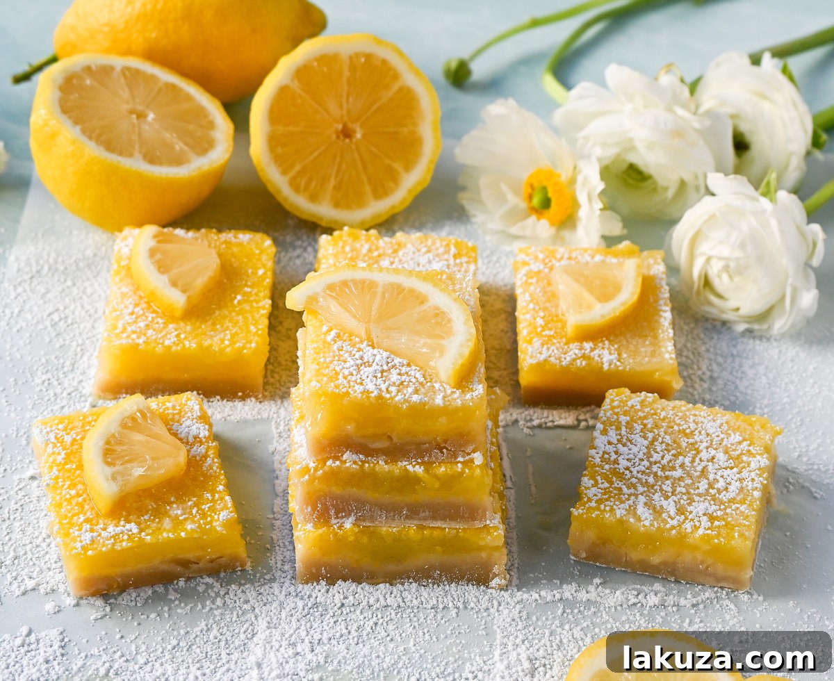 Sunshine Lemon Squares 5 Ingredients for lemon bars laid out: fresh lemons, butter, sugar, flour, and eggs. Emphasizes the use of fresh, high-quality components.