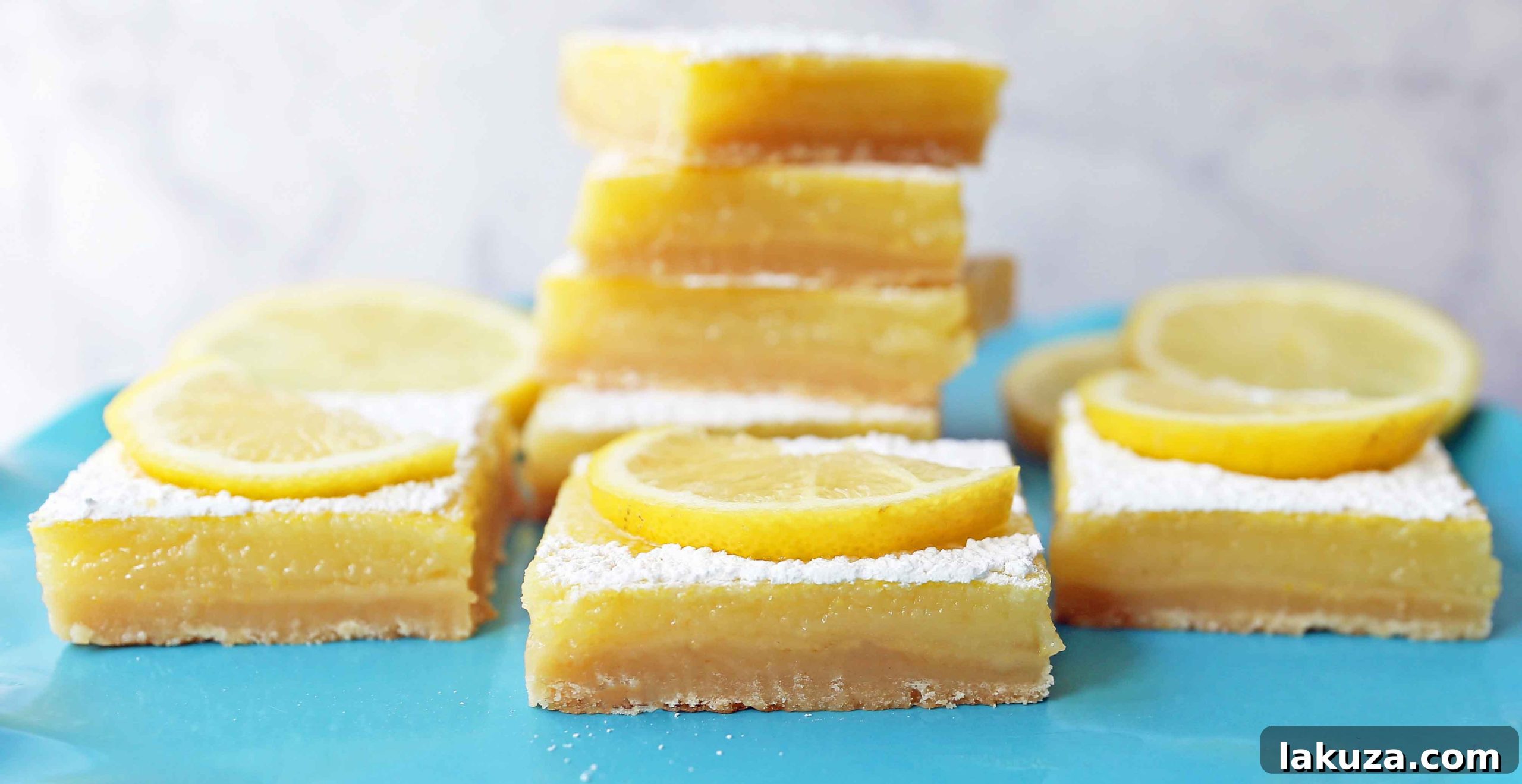 Sunshine Lemon Squares 9 A close-up of a single lemon bar, highlighting the thick, creamy lemon curd and the crumbly shortbread crust, on a rustic background.