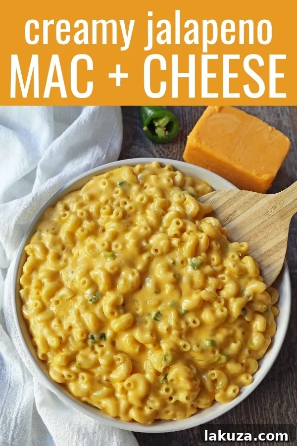 Creamy Jalapeno Macaroni and Cheese. Stovetop homemade creamy macaroni and cheese with sauteed jalapenos. Mac and Cheese with a kick! www.modernhoney.com #macandcheese #macaroniandcheese #jalapenomacandcheese #homemademacandcheese #sidedish