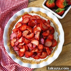 Strawberry Cream Cheese Pie. An easy sweet cream cheese pie with a buttery graham cracker crust and topped with glazed strawberries. The best strawberry pie!