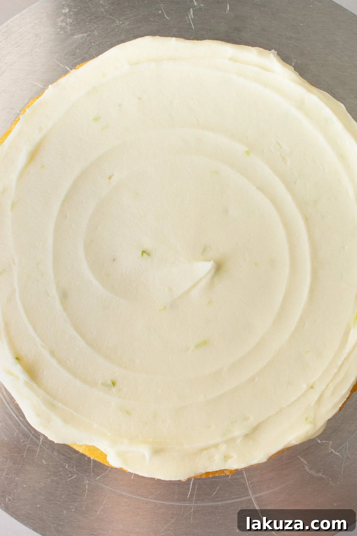 Zesty Key Lime Indulgence 10 How to frost a key lime cake with cream cheese frosting.