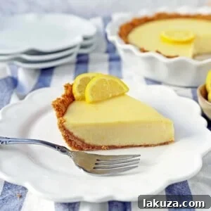 Lemon Cream Pie. A simple creamy lemon cream pie with fresh lemon zest in a buttery graham cracker crust with sweetened whipped cream. The BEST Lemon Pie Recipe.