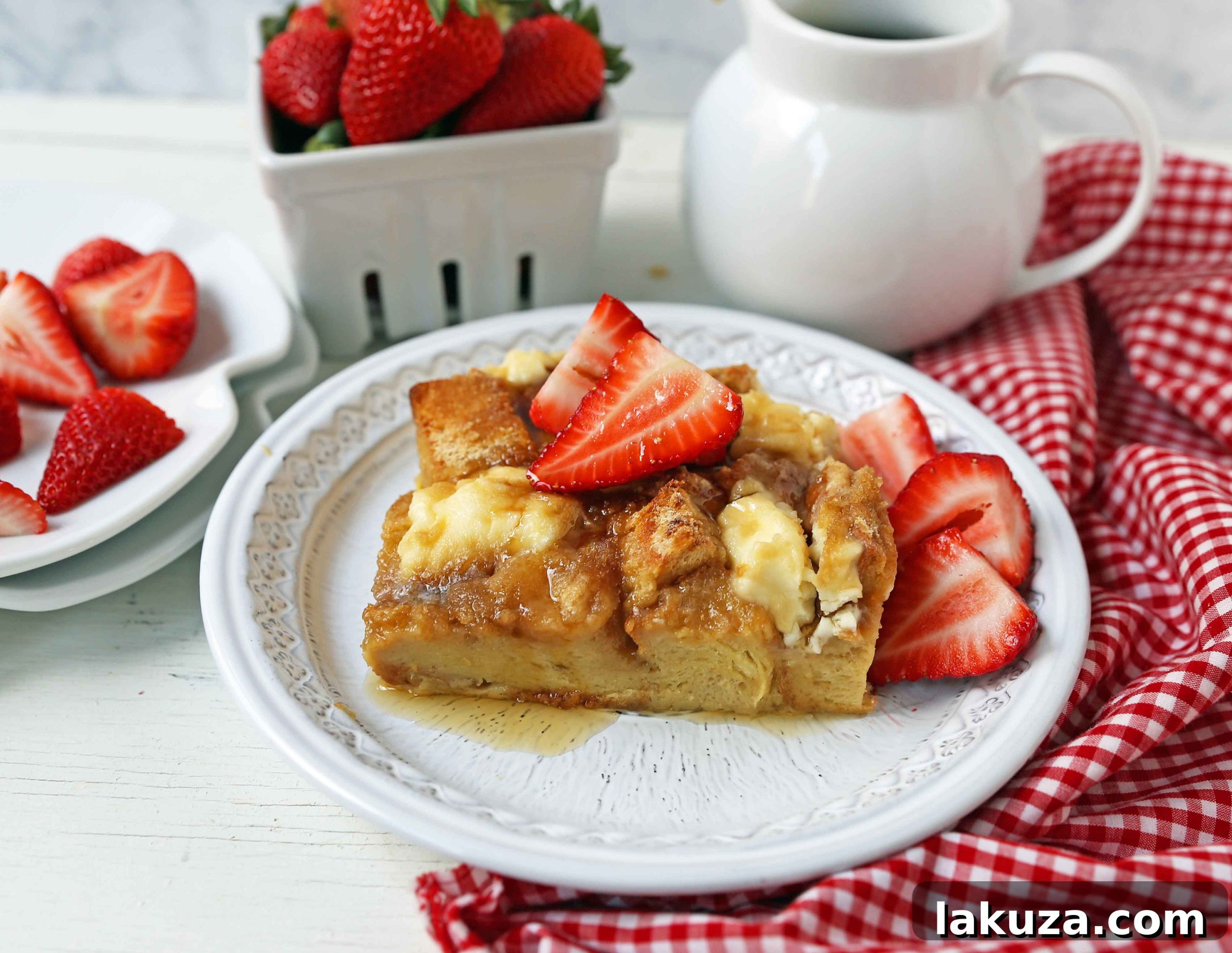 Brunch Bliss French Toast 2 Rich and creamy Baked French Toast Casserole with golden challah bread, sweet cream cheese, and a delightful brown sugar streusel, perfect for an easy overnight breakfast.