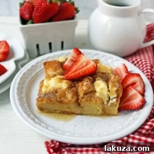 Baked French Toast Casserole with challah bread, sweet cream cheese, and brown sugar streusel, an easy overnight French toast recipe.