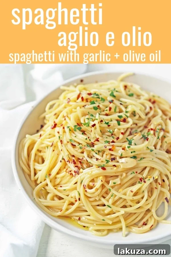 A serving of Spaghetti Aglio e Olio in a white bowl, garnished with fresh parsley, ready to be enjoyed.