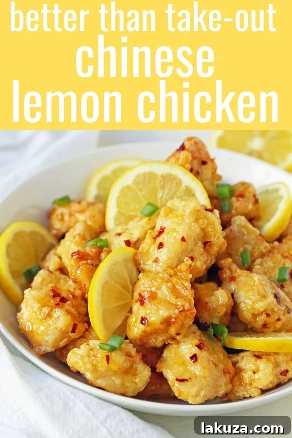 Golden Crispy Lemon Chicken 6 A stunning close-up of Chinese Lemon Chicken, showcasing the crispy texture of the chicken coated in a glossy, sweet, and tangy lemon sauce.