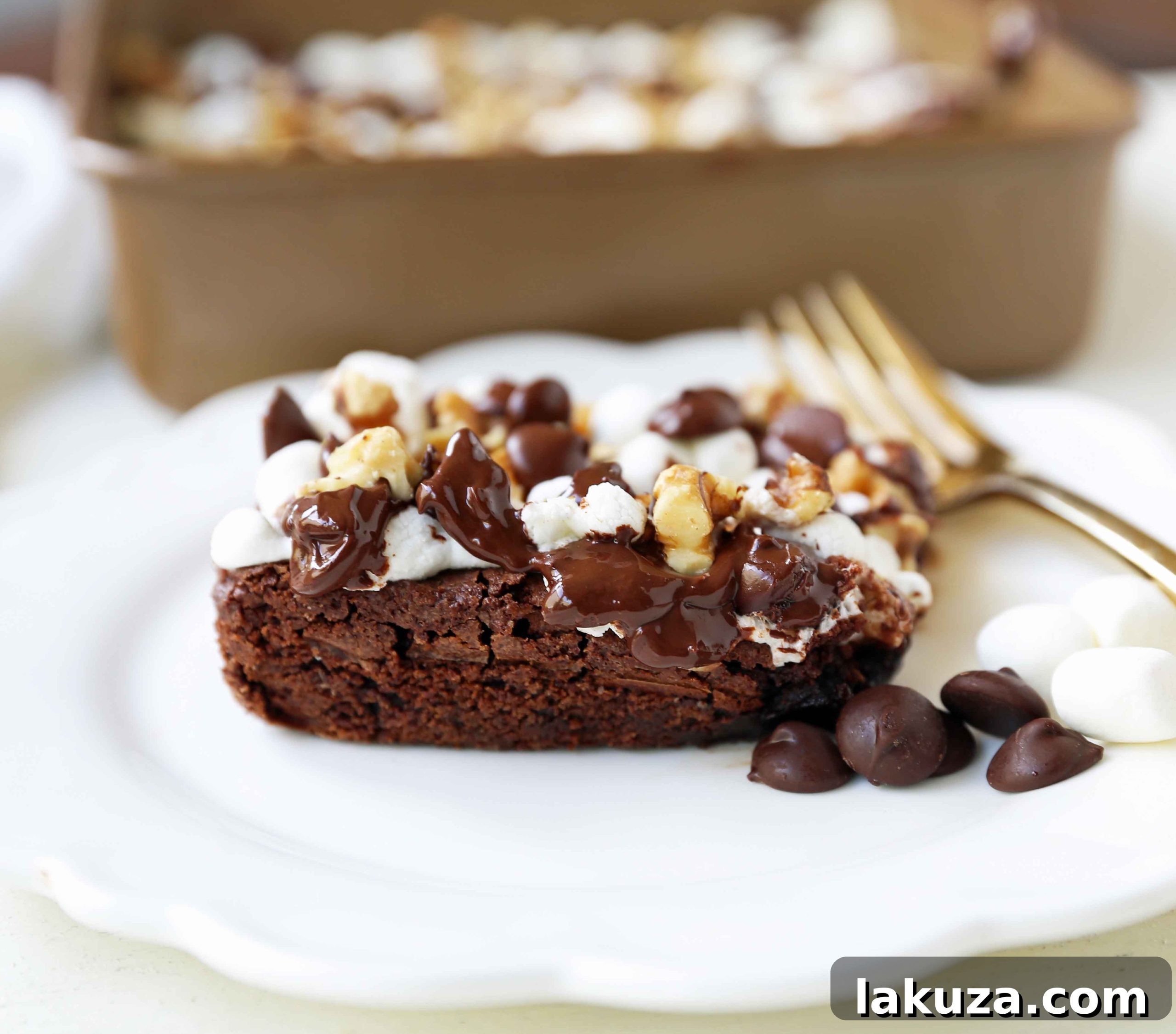 Freshly baked Rocky Road Brownies on a cooling rack, showcasing the marshmallow and walnut topping.