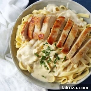 Creamy Chicken Fettuccine Delight 6 Chicken Fettuccine Alfredo with creamy sauce and sautéed chicken.