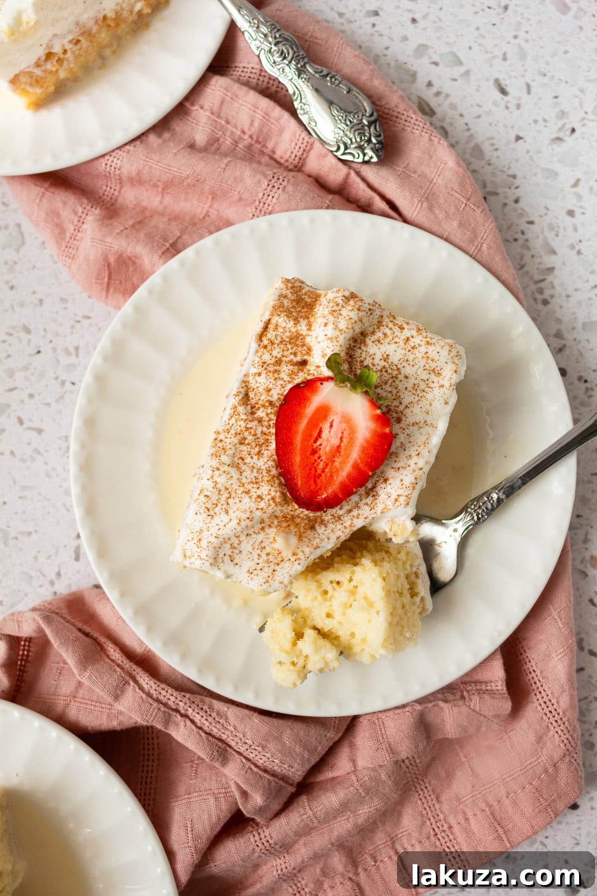 Tres Leches Cake. A classic Mexican dessert made with a vanilla sponge cake soaked with three kinds of milk -- heavy cream, evaporated milk and sweetened condensed milk and topped with fresh sweetened whipped cream. An authentic Mexican dessert recipe!