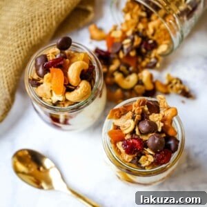 Chocolate Coconut Granola. A decadent chocolate coconut granola with cashews, dried cranberries, apricots, almonds, coconut flakes, and chocolate chips. The best Chocolate Coconut Granola Recipe.