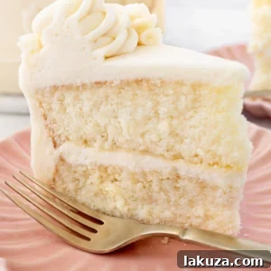 Homemade vanilla cake with vanilla bean buttercream frosting.
