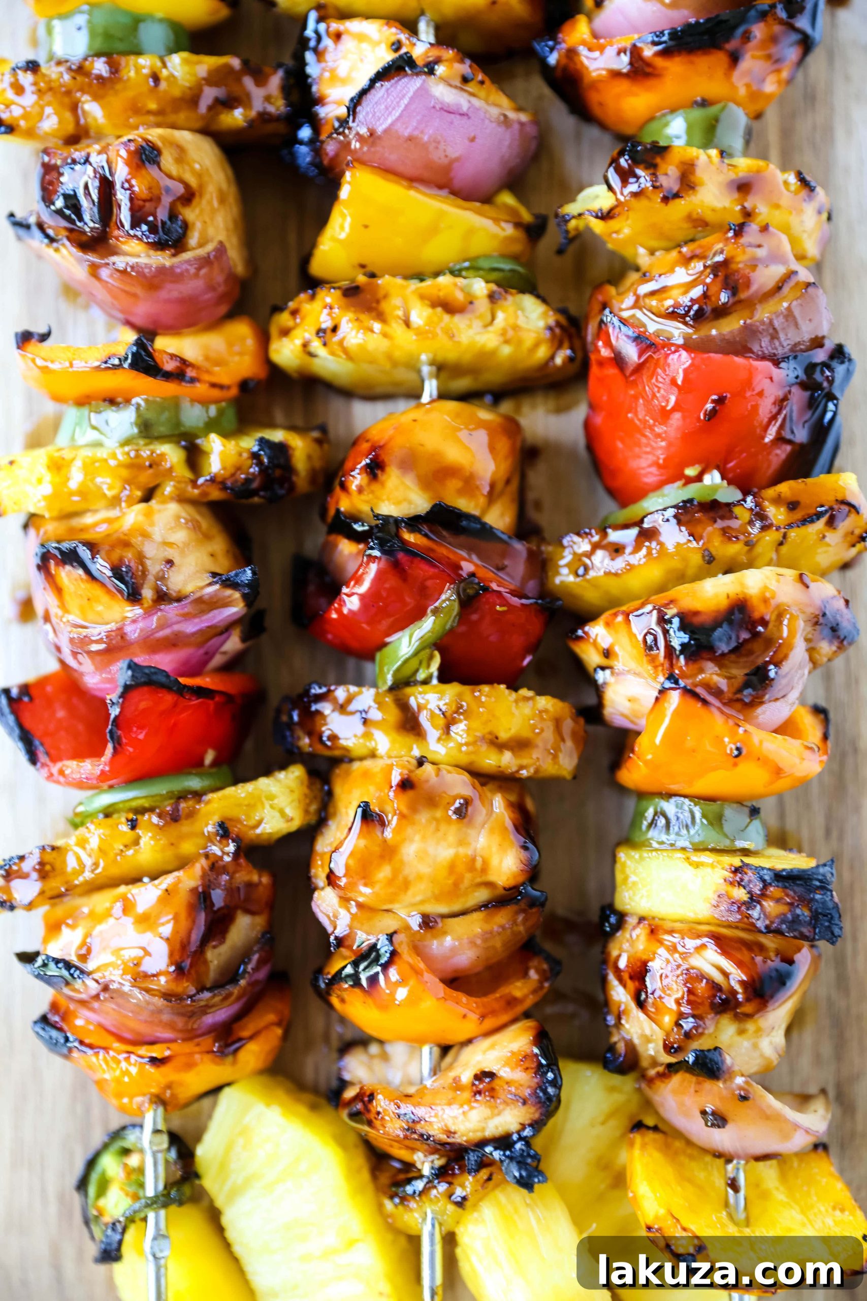 Aloha Teriyaki Chicken Skewers 2 Hawaiian Teriyaki Chicken Skewers: Grilled chicken skewers with colorful peppers, red onion, pineapple, and a touch of jalapeño, all basted in a rich teriyaki sauce and grilled to perfection.