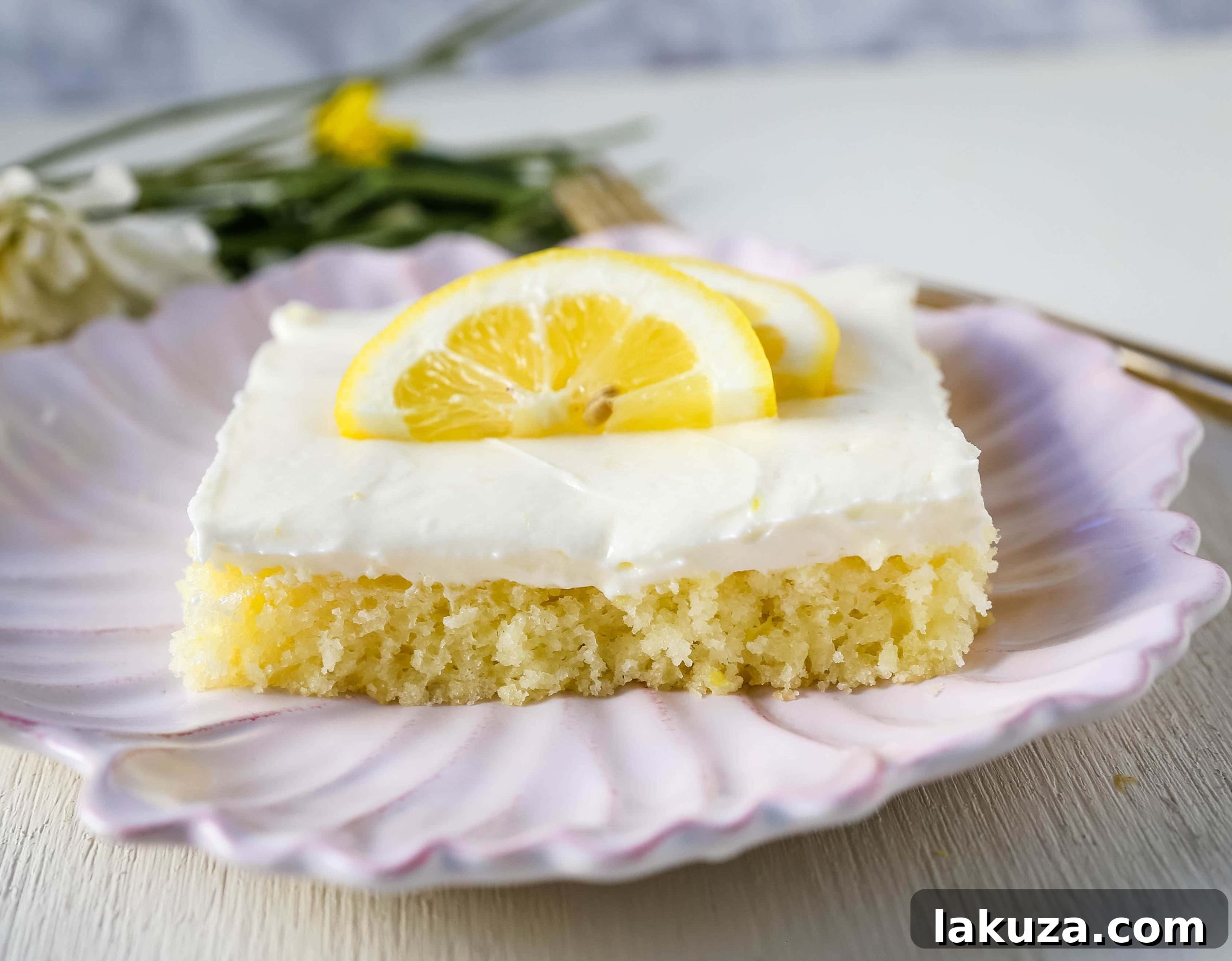 Sunshine Lemon Sheet Cake 3 Lemon Sheet Cake Recipe. Moist sour cream lemon sheet cake recipe with a fresh lemon cream cheese frosting. #lemonsheetcake #cake