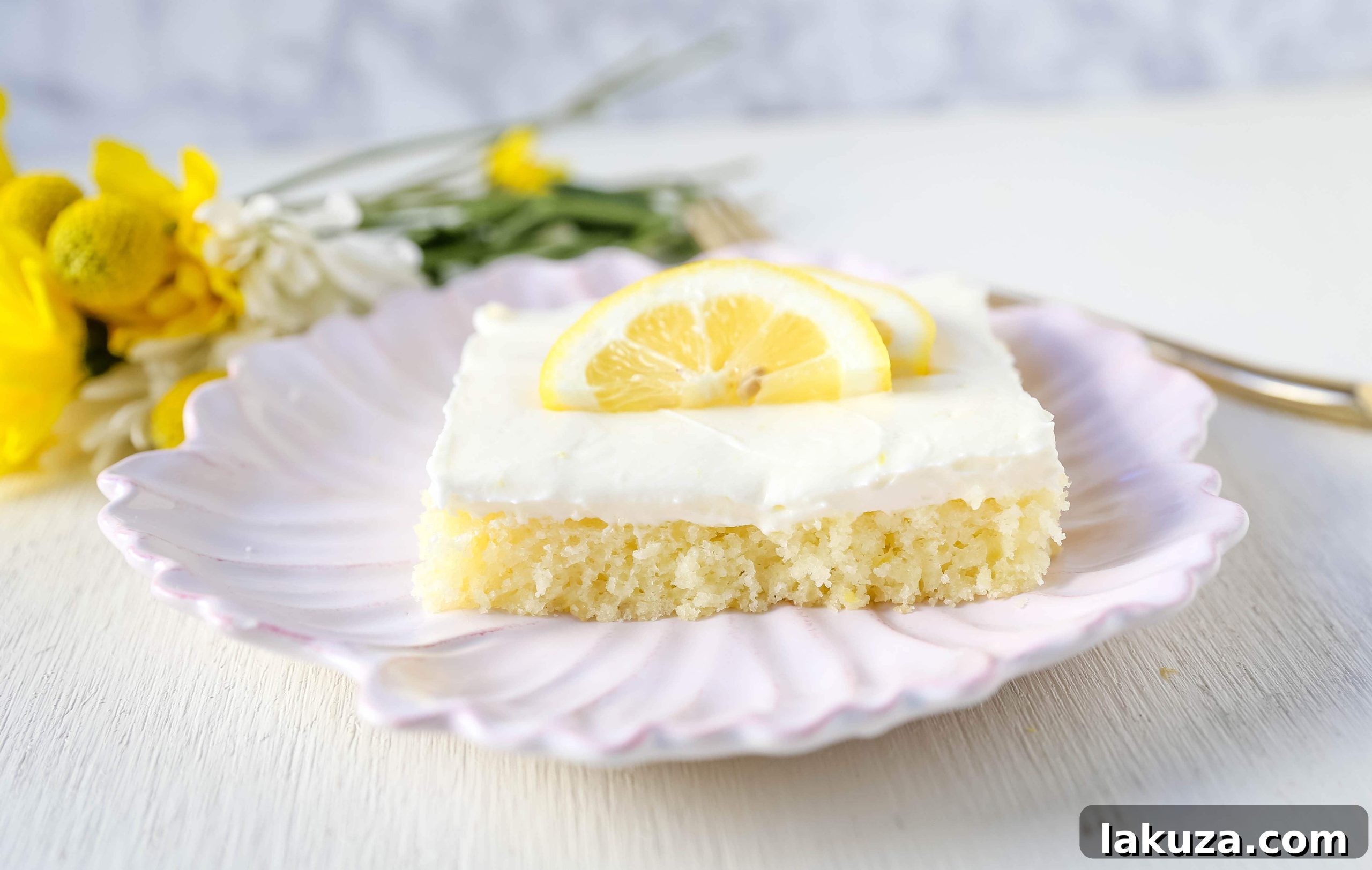 Sunshine Lemon Sheet Cake 7 Lemon Sheet Cake Recipe. Moist sour cream lemon sheet cake recipe with a fresh lemon cream cheese frosting. #lemonsheetcake #cake