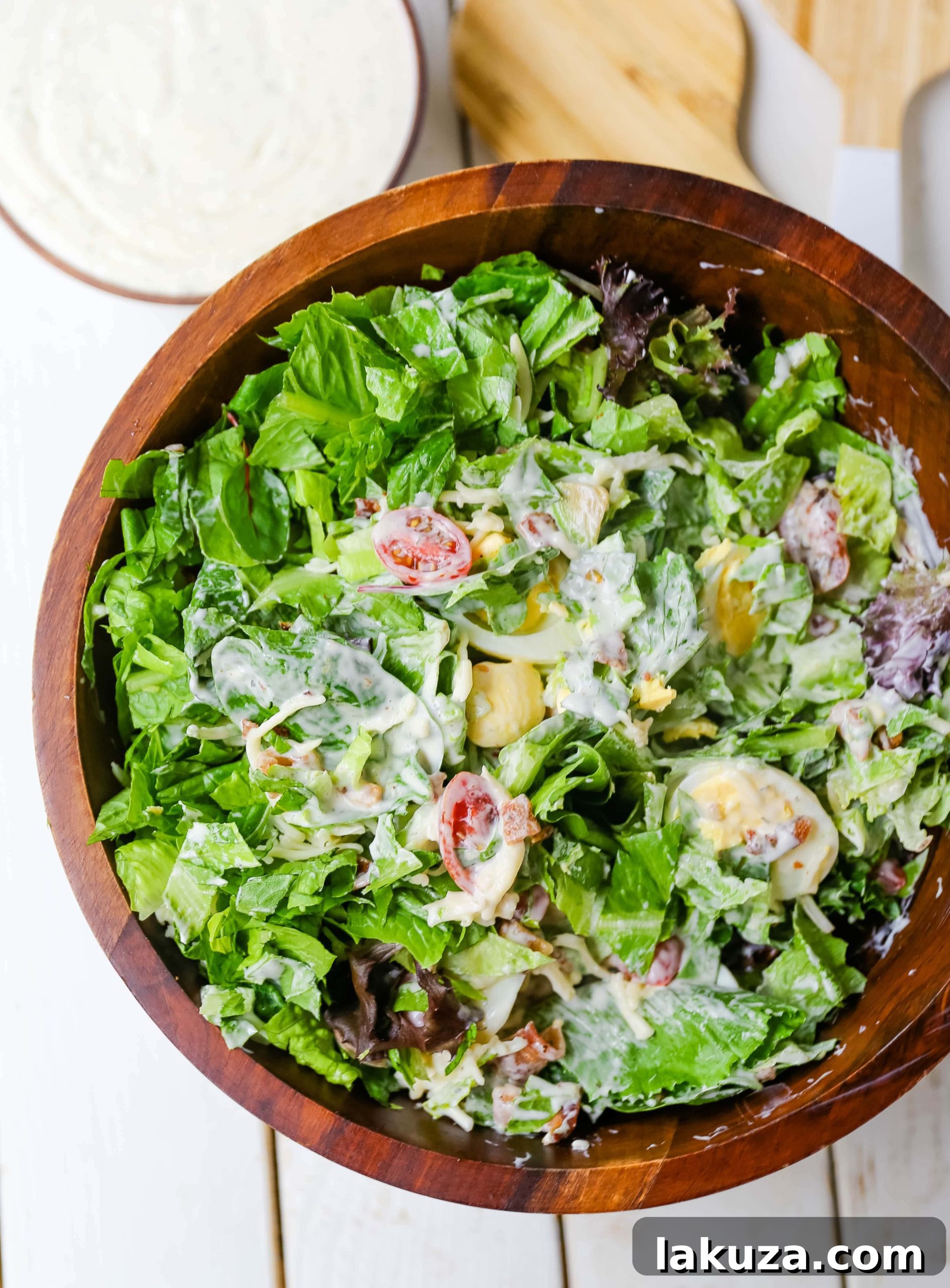 The Quintessential Cobb Salad 4 Avocado slices and grape tomatoes ready for Cobb Salad