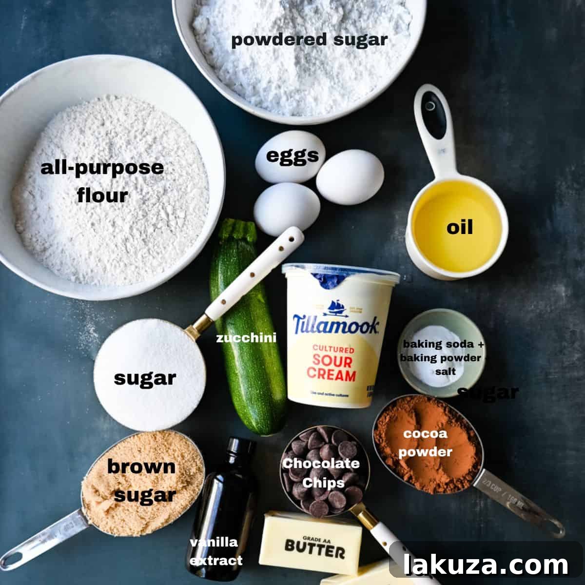 Ingredients laid out for a chocolate zucchini cake.