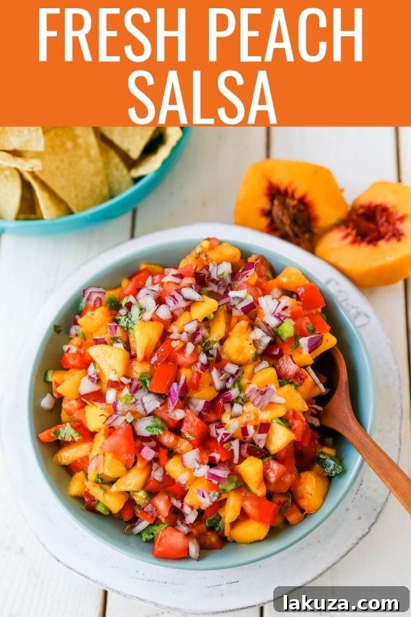 Fresh Peach Salsa in a small white bowl, garnished with a sprig of cilantro.