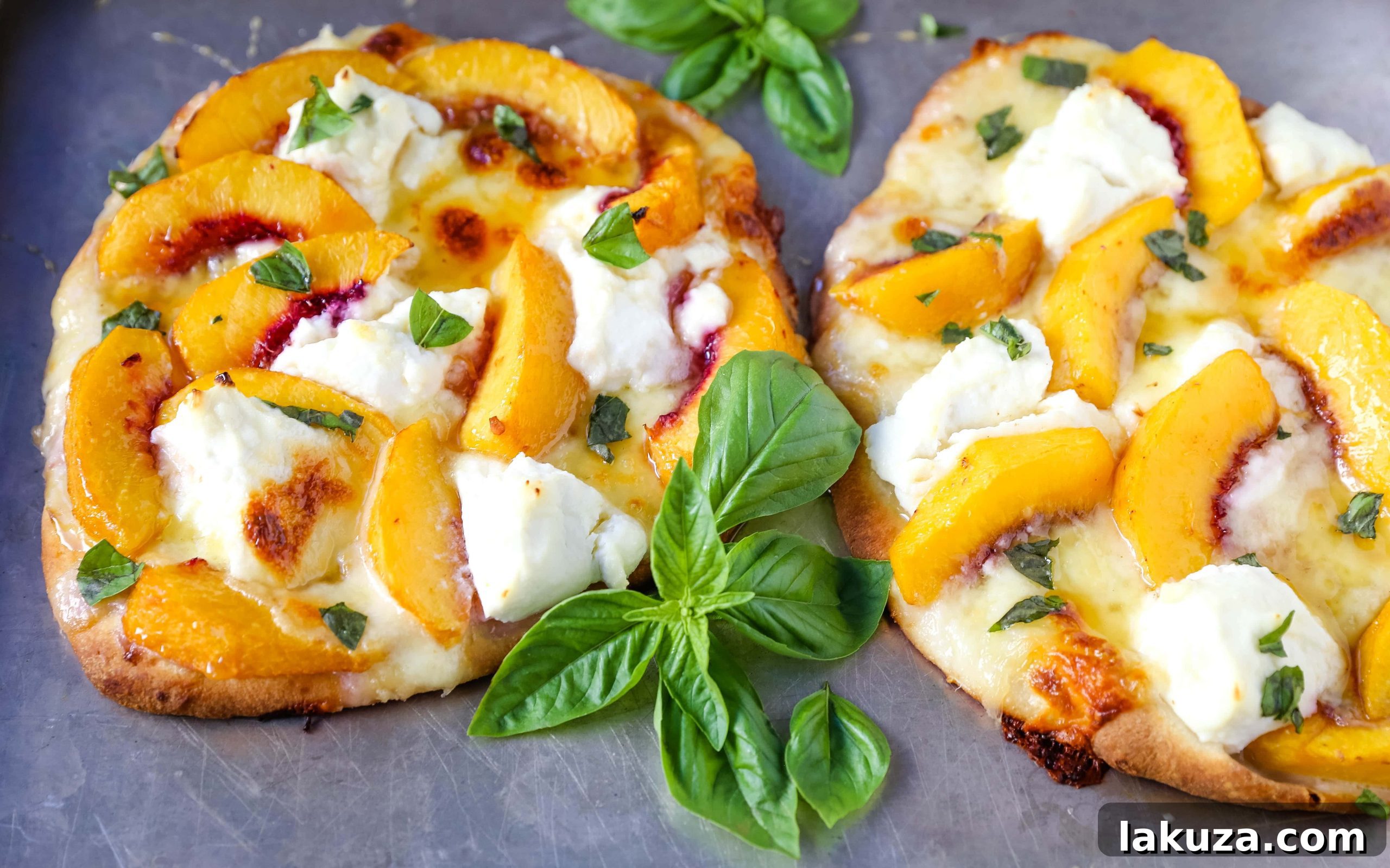 Sun-Kissed Peach & Basil Mozzarella Flatbread 3 Close-up of freshly baked Peach Basil Mozzarella Flatbread, showcasing the melted mozzarella, dollops of ricotta, and vibrant peach slices, ready to be drizzled with honey and fresh basil. A savory-sweet summer pizza idea.