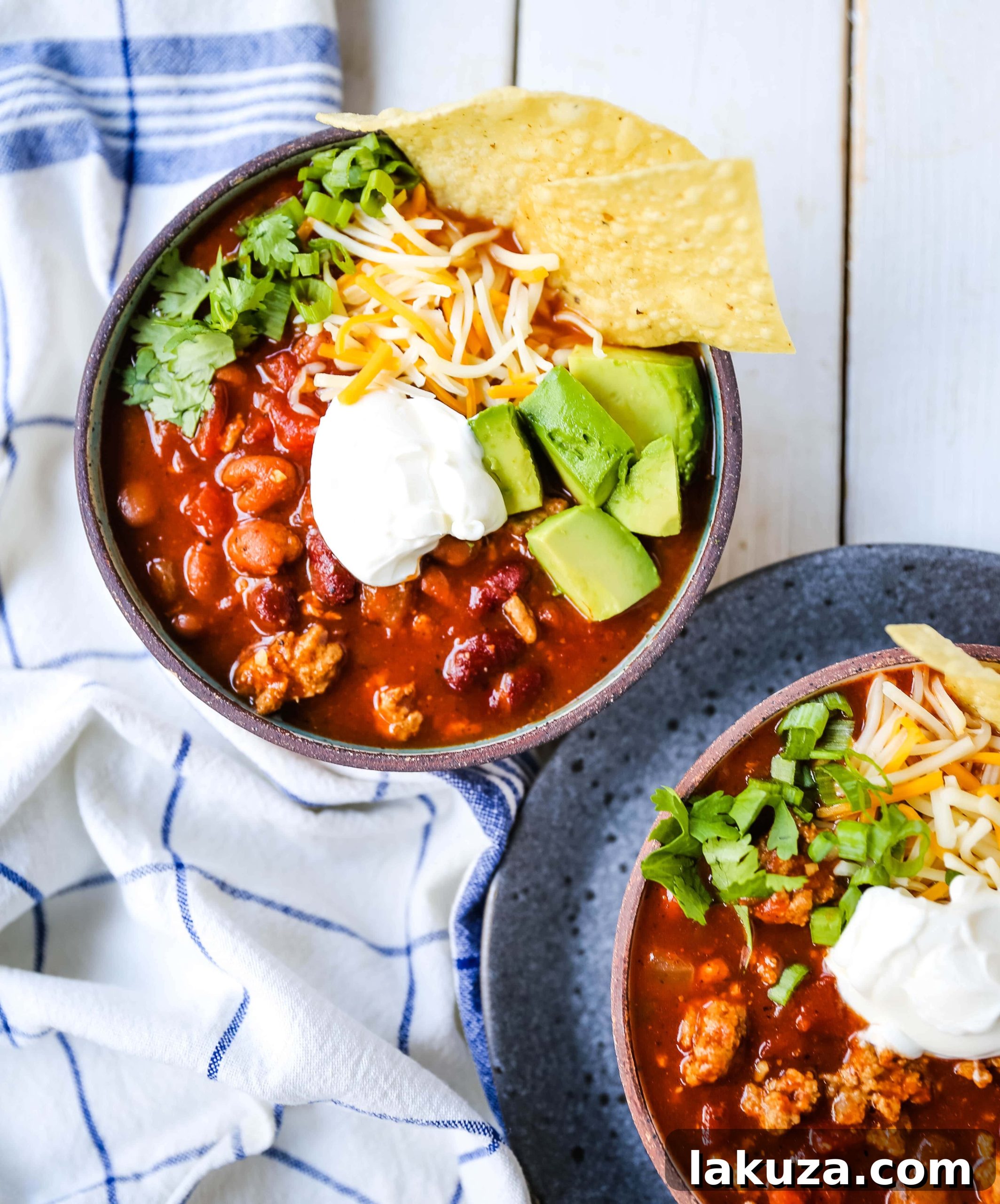 Delicious and hearty turkey chili, made with lean ground turkey, seasoned beans, and rich tomato sauce, perfect for fall gatherings and game day