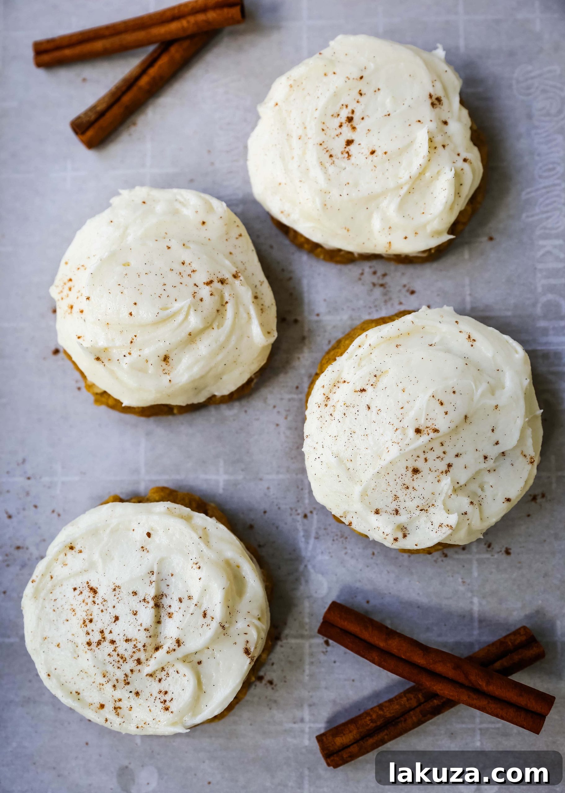 Decadent Pumpkin Cookies with Cream Cheese Frosting 4 Stack of freshly baked pumpkin cookies with cream cheese frosting, ready to be enjoyed