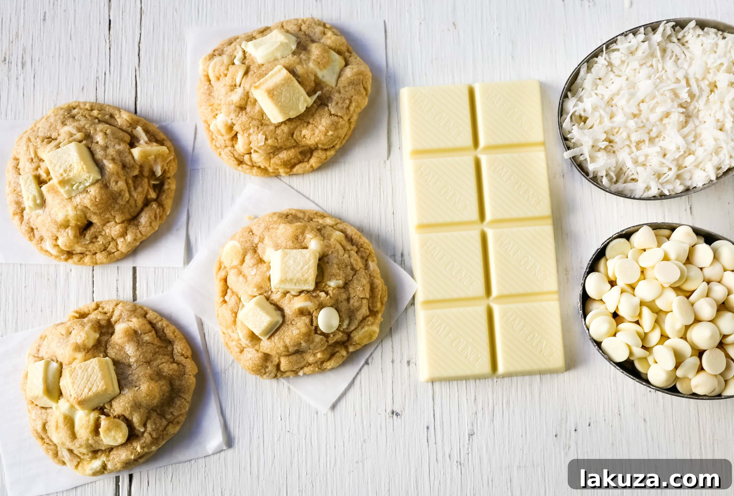 Tropical White Chocolate Coconut Delights 5 A vibrant spread of White Chocolate Coconut Cookies artfully arranged, highlighting their golden hue and inviting texture.