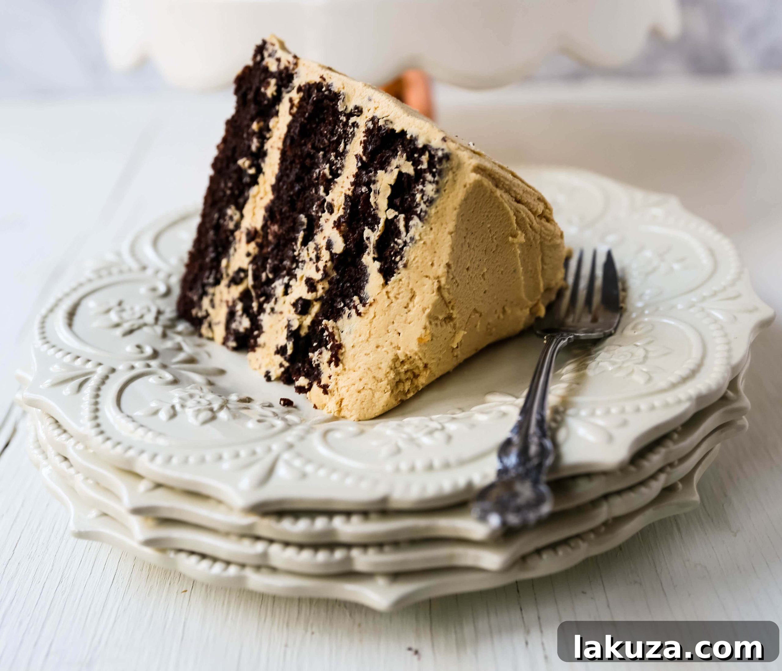 Overhead view of the Chocolate Cake with Peanut Butter Frosting, ready to be served at a celebration.