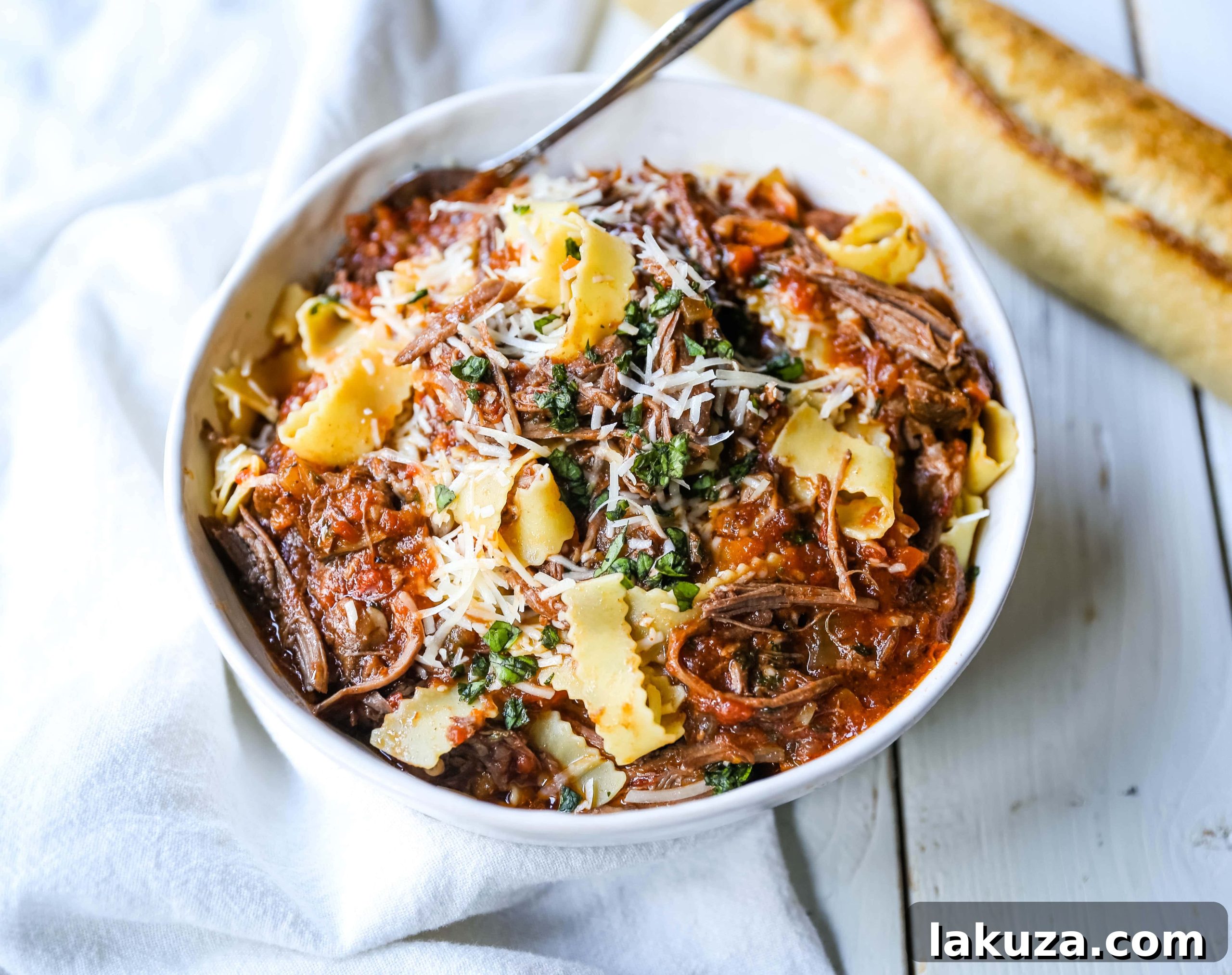 Hearty Sunday Slow Cooker Beef Ragu 3 Sunday Slow Cooker Beef Ragu. Authentic Italian Beef Ragu. The ultimate comfort food! A big bowl of slow cooked, braised beef in a rich, robust tomato sauce tossed with pasta. I guarantee that you will go back for seconds! www.modernhoney.com #slowcooker #beefragu #italianfood #italian