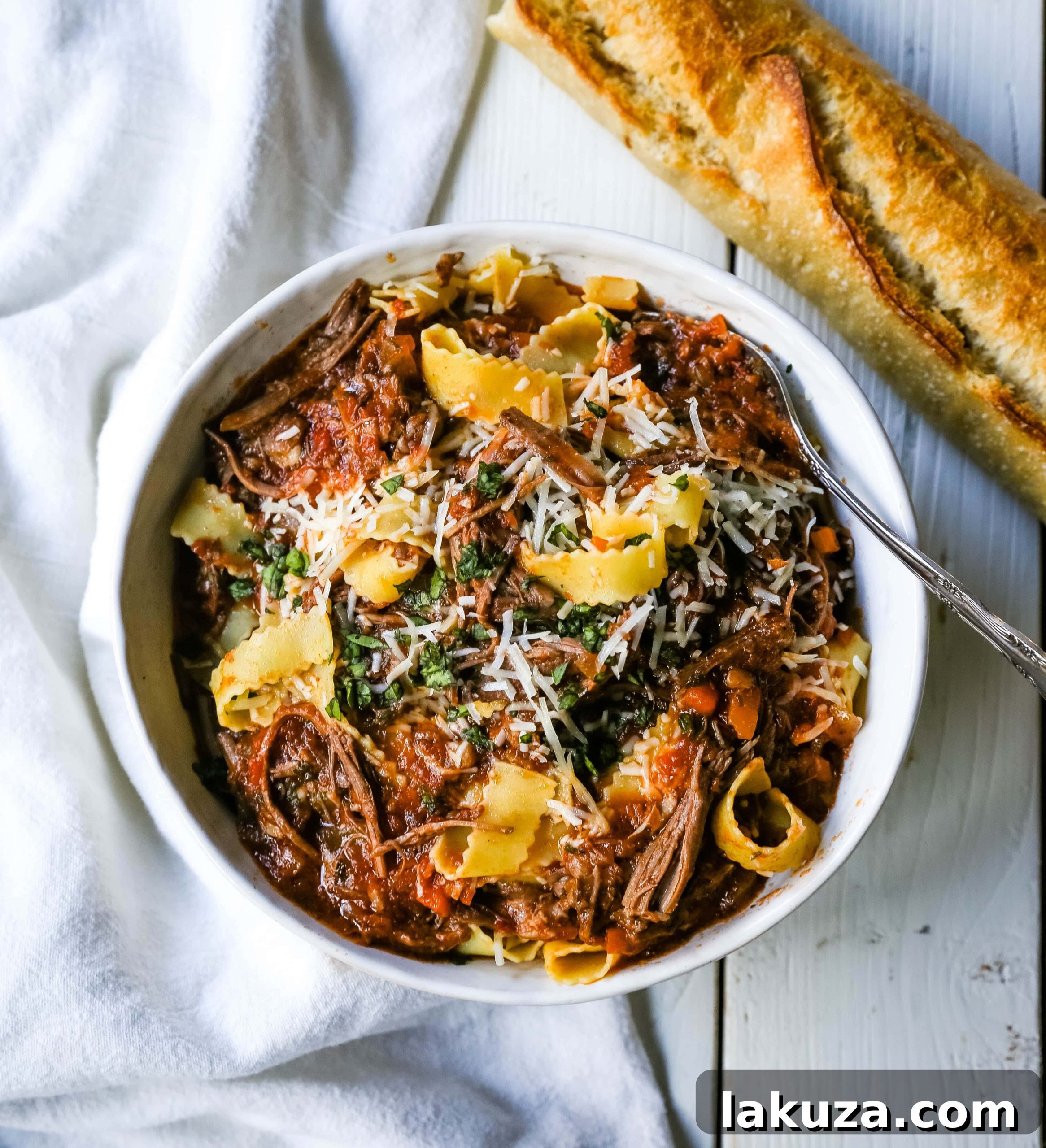 Hearty Sunday Slow Cooker Beef Ragu 6 Sunday Slow Cooker Beef Ragu. Authentic Italian Beef Ragu. The ultimate comfort food! A big bowl of slow cooked, braised beef in a rich, robust tomato sauce tossed with pasta. I guarantee that you will go back for seconds! www.modernhoney.com #slowcooker #beefragu #italianfood #italian